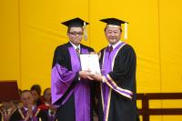 Prof. Cheng (left) receives the award from the Provost of CUHK